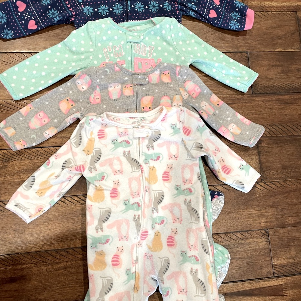 4 pairs Carter’s fleece footie pajamas